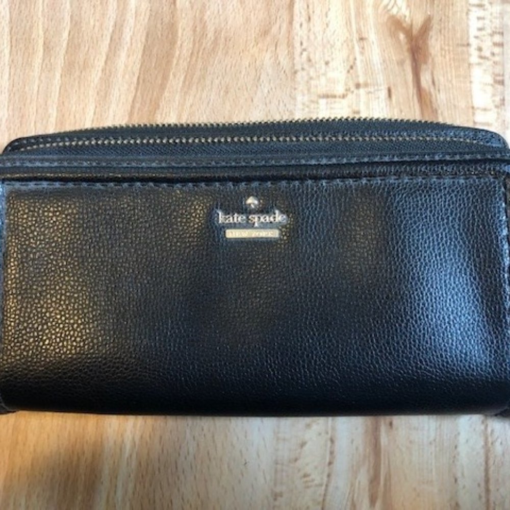 Brand new kate spade black leather wallet.